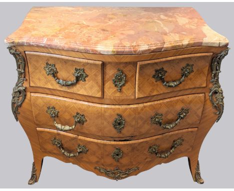 A Louis XV style kingswood bombe commode,  parquetry inlaid, red marble top, serpentine front,  H.87cm  W.106cm D.50cm