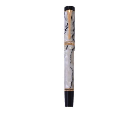 Parker, Duofold Centennial, a pearl marbled fountain pen, the cap with gilt arrow clip and double cap band, the fine nib stam