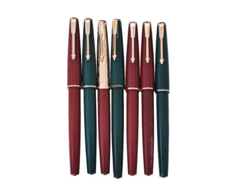 Parker, 17, three green fountain pens, the caps with gilt arrow clip and cap bands, squeeze bar filling systems; together wit