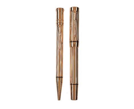 Parker, Duofold, a rare retail sample gilt metal fountain pen and roller ball pen, the fountain pen cap with arrow clip, cap 
