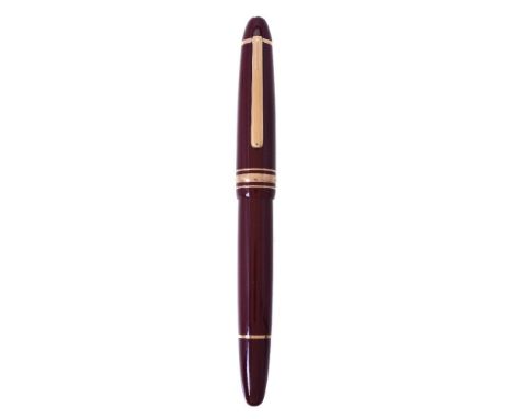 Montblanc, Meisterstuck 146, a burgundy fountain pen, the cap with a gilt clip and triple cap band, the double broad nib stam