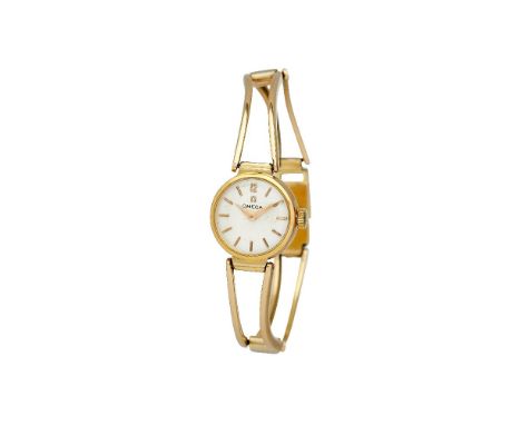 Omega,   Lady's gold coloured bracelet watch, no. 7044 11339432   Movement: Cal. 213, manual wind 17 jewels   Case: Gold colo