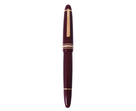 Montblanc, Meisterstuck 146, a burgundy fountain pen, the cap with a gilt clip and triple cap band, the fine nib stamped 14K,