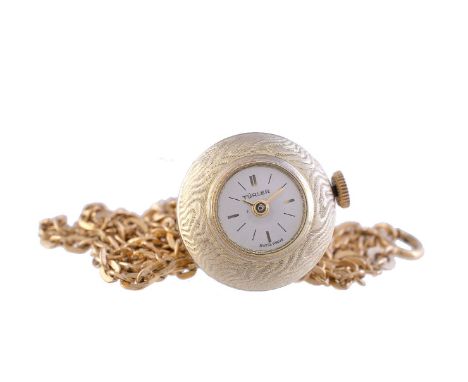Turler,   Gilt metal globe pendant watch   Movement: Cal. ETA 2410, manual wind, 17 jewels   Case: Gilt metal two piece case 