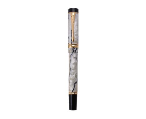 Parker, Duofold International, a pearl marbled fountain pen, the cap with gilt arrow clip and double cap band, the medium nib