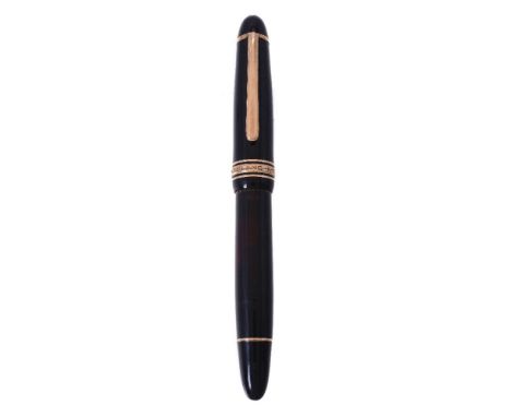 Montblanc, Meisterstuck 146, a black fountain pen, the cap stamped with the Bayer logo, a gilt clip and triple cap band, the 