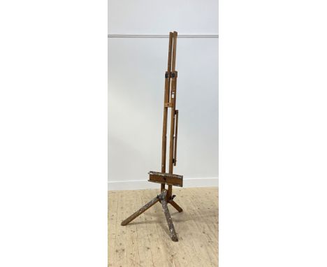 A large vintage beech folding artists easel, raised on triple splayed supports, H170cm