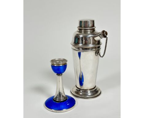 A Sheffield 1920 silver blue guilloche enamelled single dressing table candlestick, the silver top above a blue enamelled pan