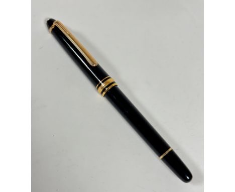 A Mont Blanc black cased and gilt mounted fountain pen, model 4810, with 14ct gold mounted nib, shows some signs of use and w