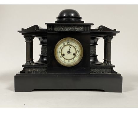 A Victorian slate mantel clock of architectural form, the case with frieze depicting figures in Classical dress, white ivorin