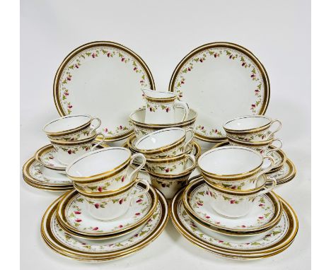 A Royal Albert thirty nine piece tea set including two cake plates, (d: 23cm), twelve side plates, (d: 17.5cm) twelve saucers