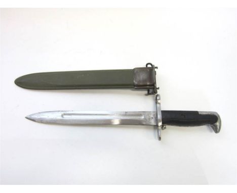 A U.S. M1 GARAND BAYONET by Pal Blade and Tool, in its fibreglass scabbard.