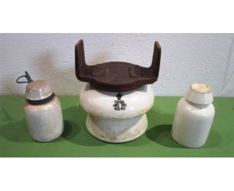 TWO GREAT WESTERN RAILWAY CERAMIC INSULATORS each impressed 'G.W.R.' and 12.5cm high; together with a British Railways cerami