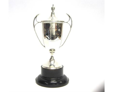 A SILVER TWO HANDLED TROPHY CUPS & COVER Sheffield 1927, leaf capped handles, lift off rising cover, inscribed, 27.5cm tall, 