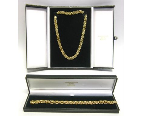 AN 18 CARAT GOLD BRACELET & NECKLACE SET with London import marks, of fancy knotted links, bracelet 19.8cm long, necklace 43.