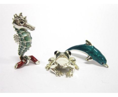 A SILVER AND RESIN DECORATED MODEL OF A FROG London import 1999; with a silver and resin decorated model of a sea horse, Lond