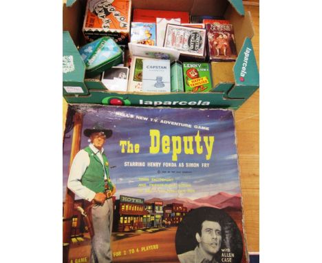 A COLLECTION OF PLAYING CARDS & CARD GAMES together with a Bell board game, 'The Deputy', boxed.