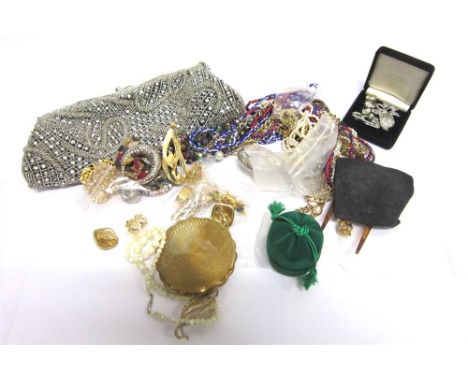 A COLLECTION OF ASSORTED COSTUME JEWELLERY a powder compact; and a paste set and beaded bag