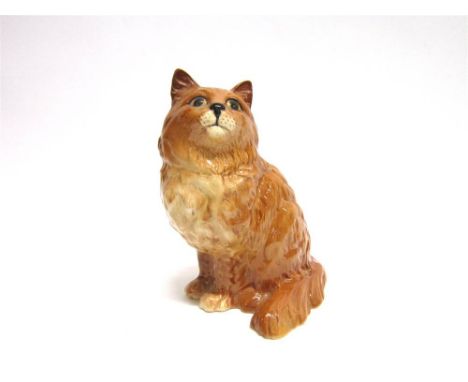 A BESWICK POTTERY MODEL OF A SEATED GINGER CAT no 1867, 20cm high