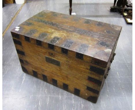A METAL BOUND TRUNK  with four cast carrying handles and with engraved plaque 'The Honble F. Lyon', 82cm wide, 51cm deep, 53c