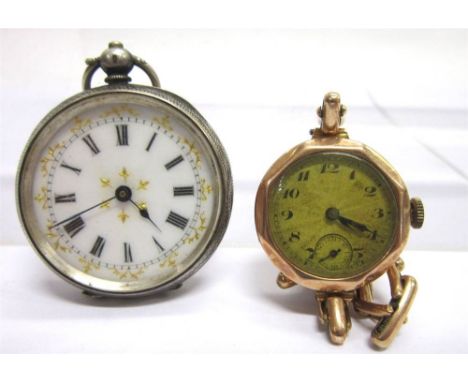 A LADY'S 9CT GOLD WRISTWATCH on an expanding baton link bracelet, cased; with a Continental silver fob watch