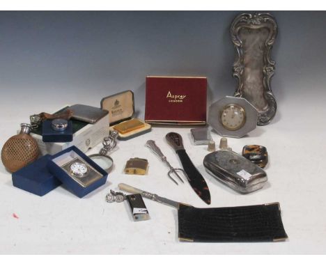 An assorted collection of items including a leather wallet by Dunhill, a Ronson lighter, a bedside clock by S. Day, two small