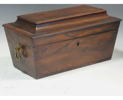 A 19th century rosewood sarcohpagus shaped tea caddy enclosing twin compartements and glass beaker, 20 x 35 x 19cm