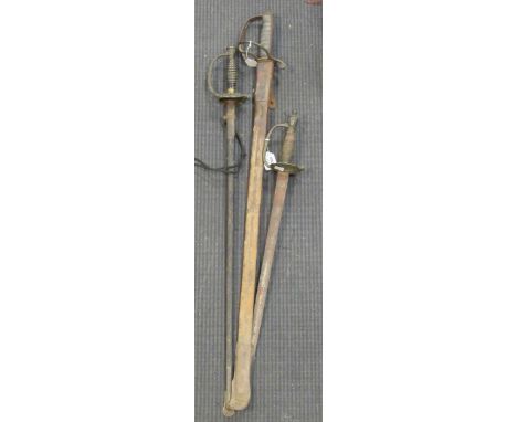 An Edward VII Royal Artillery sword with leather scabbard together with two other swords (3)There does not appear to be any d