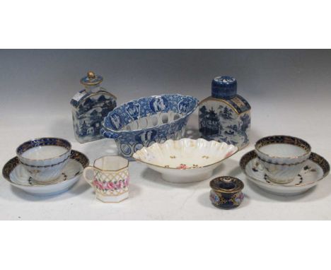 Two blue and white caddy bottles, one with stopper the other with associated cover, an English pearlware oval blue and white 