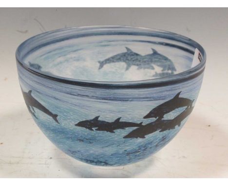 Attributed to Malcolm Sutcliffe, a small glass bowl decorated with dolphins 10.5cm high and 16cm diameterSome light scratchin