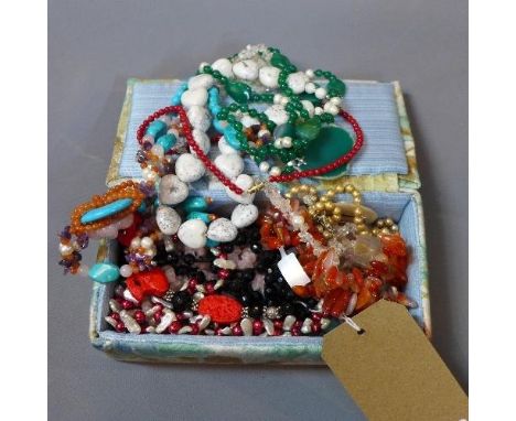 A collection of semi precious necklaces to include tanzanite, amazonite, ruby, garnet, turquoise, agate etc 