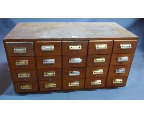 A mid 20th century light oak filing cabinet, H.44 W.90 D.42cm 