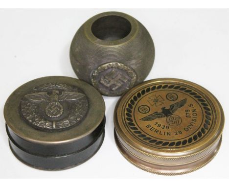 A group of German Nazi items comprising a horn snuff box of cylindrical form with swastika eagle to top, a match striker bear