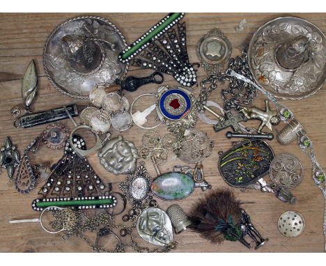 A mixed lot of silver and white metal include to Mexican silver sombreros, a Scottish enamel brooch etc.  