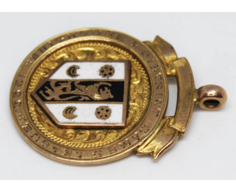 A hallmarked 9ct gold enamel games medal, gross wt. 6.7g.  