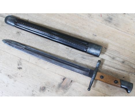 An Italian Carcano model 1891 bayonet with leather scabbard, total length 43cm.  