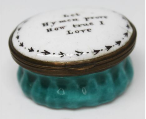 A Bilston enamel pill box circa 1800, the top inscribed 'Let Hymen prove How true I Love', length 4cm.  Condition - loss of e