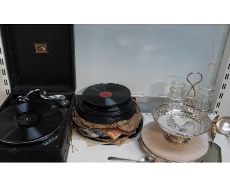 An HMV table top record player together with records, electroplated wares etc