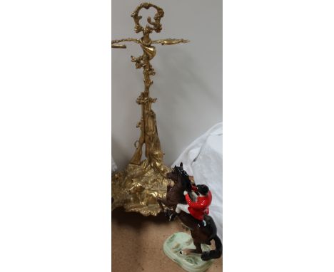 A Beswick huntsman on a rearing horse together with a gilt metal stick stand