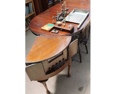 A mahogany and brass folding scales together with a gauge, wash board, blow torches, thermometer, weight and ship in a bottle