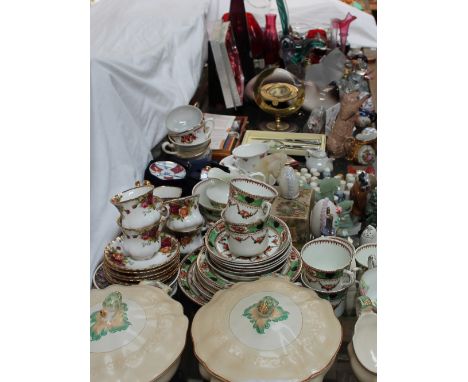 A Royal Doulton part tea service together with Johnson Brothers tureens and covers, thimble collection, jade style figures, c