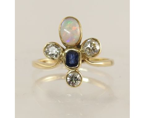 A 9ct gold ring set with diamonds, sapphire and opal of fleur de lys design, the three diamonds total approx 0.60cts, surroun