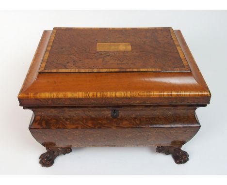 A burr walnut and satinwood cross banded two division tea caddy the hinged-shaped lid with inlaid musical score for Home Swee
