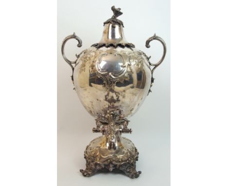 A 19th Century silver plated samovar no maker's marks, the tapering spherical body with foliate embossing, blank cartouche an