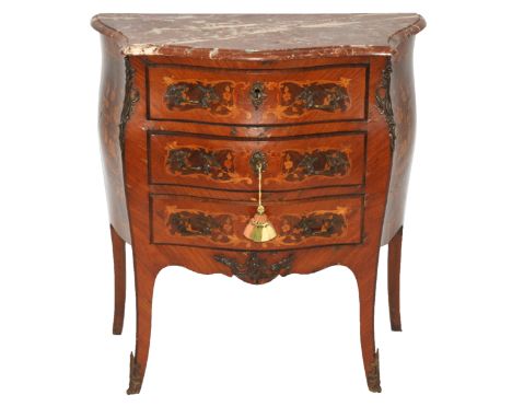 A Louis XV style rosewood serpentine shaped commode the marble top above three drawers, foliate mounts and on splayed legs, 7
