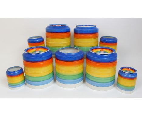 A set of Grays pottery Art Deco kitchen jars banded ware kitchen jars painted in primary colours, nine in total, printed Gall