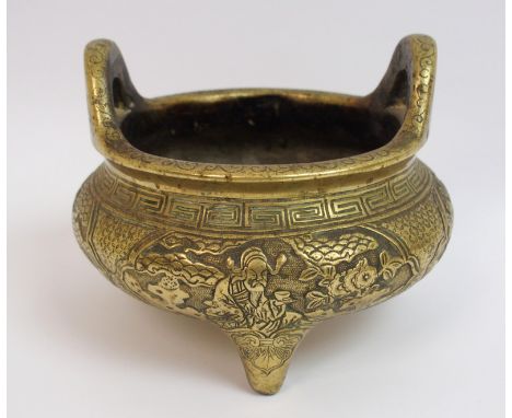A Chinese brass censor cast with panels of figures amongst trees and plants divided by diaper, beneath a key patter band and 