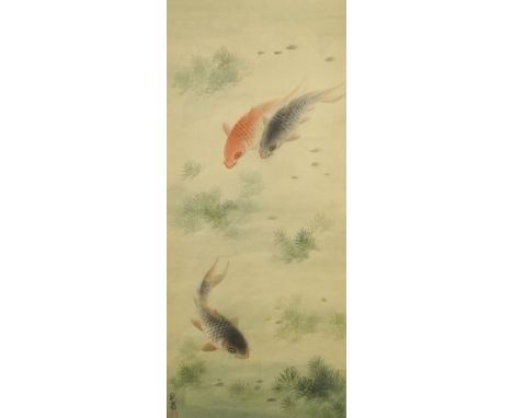 A Chinese silk scroll painting of three carp amongst aquatic foliage, signed, 92 x 40cm