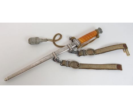 A WW2 German Heer (Army) Officer's dagger by Elckhorn Solingen, the orange grip lacking wire binding, with dress knot in shea