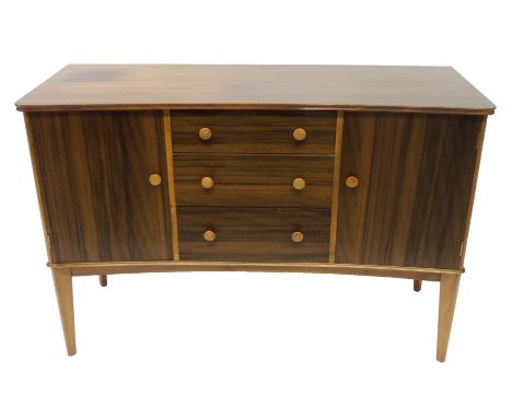 A Gibson & Slater Limited Vesper rosewood sideboard with three central drawers flanked by two doors, 137cm wide x 49cm deep x